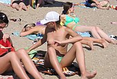 videos of girls nude changing on beach