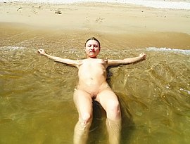 denise richard topless beach